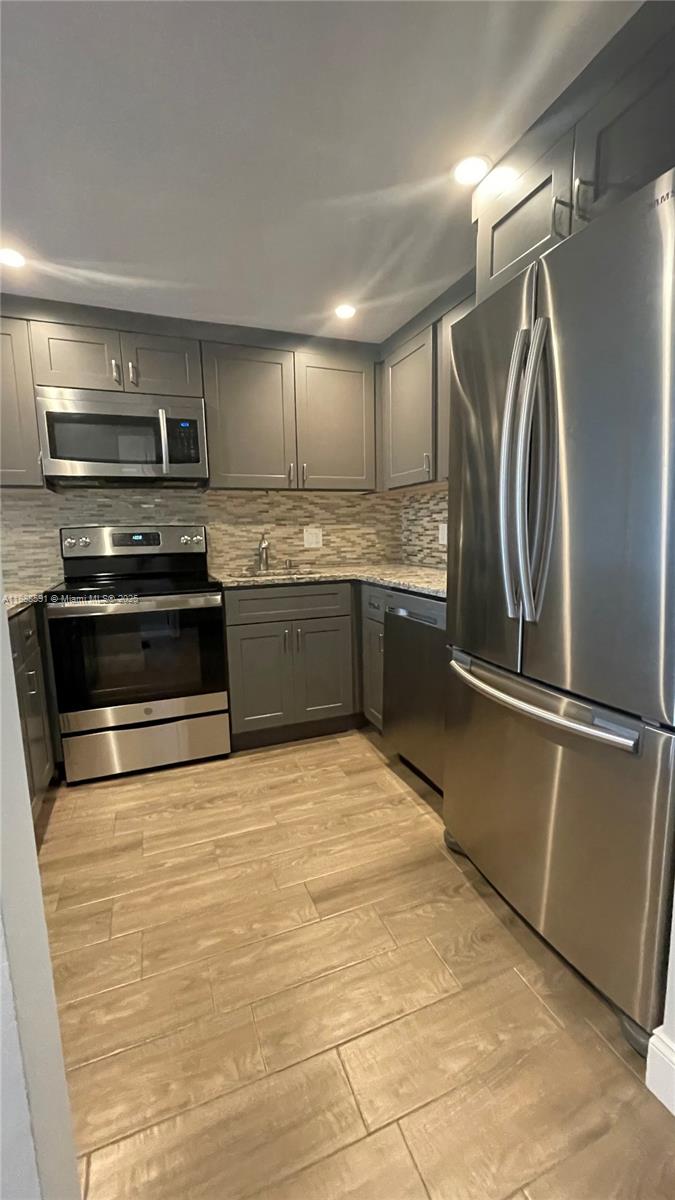 WOODSIDE APTS CONDO - Residential Lease