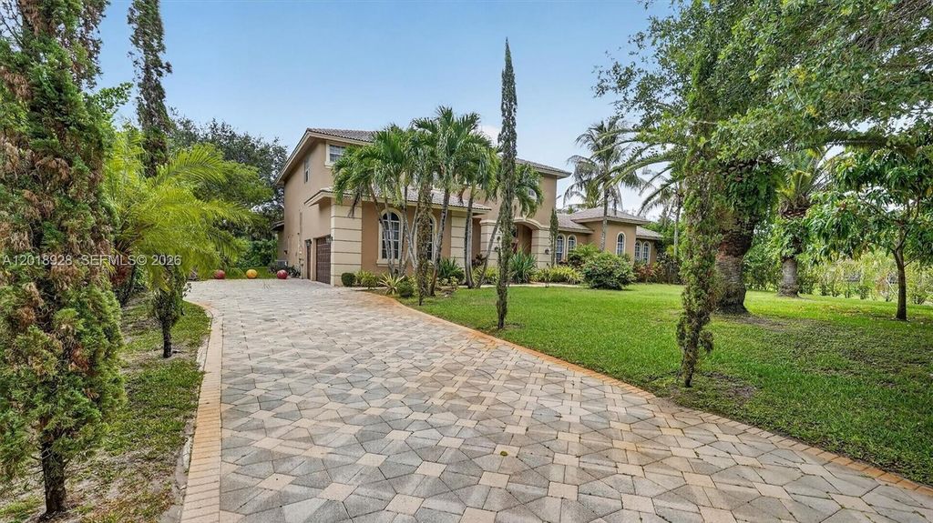 Photo of 5960 NW 79th Way, Parkland, FL 33067 (MLS # A12018928)