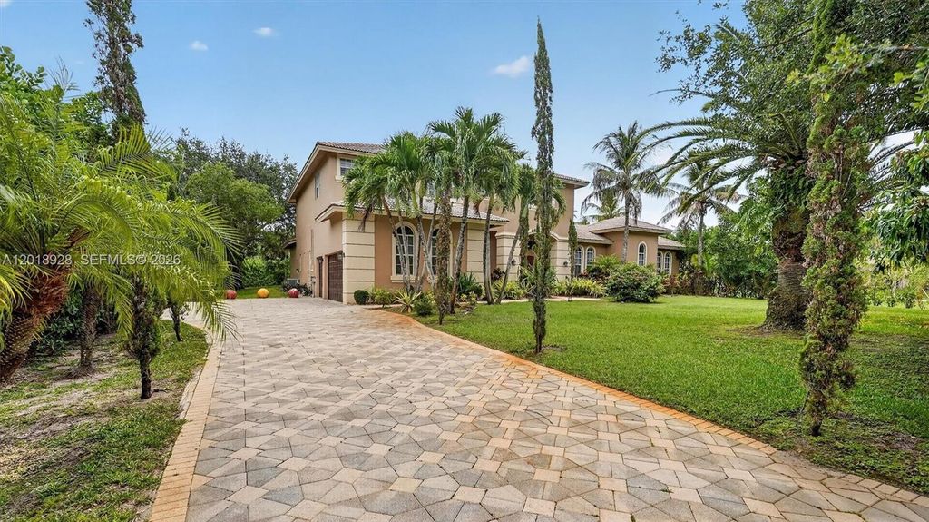 Photo of 5960 NW 79th Way, Parkland, FL 33067 (MLS # A12018928)
