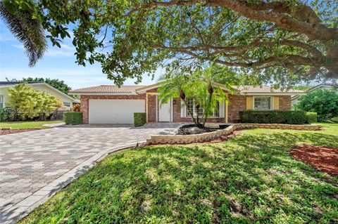 Photo of 9064 NW 23rd Pl, Coral Springs, FL 33065 (MLS # A11893559)
