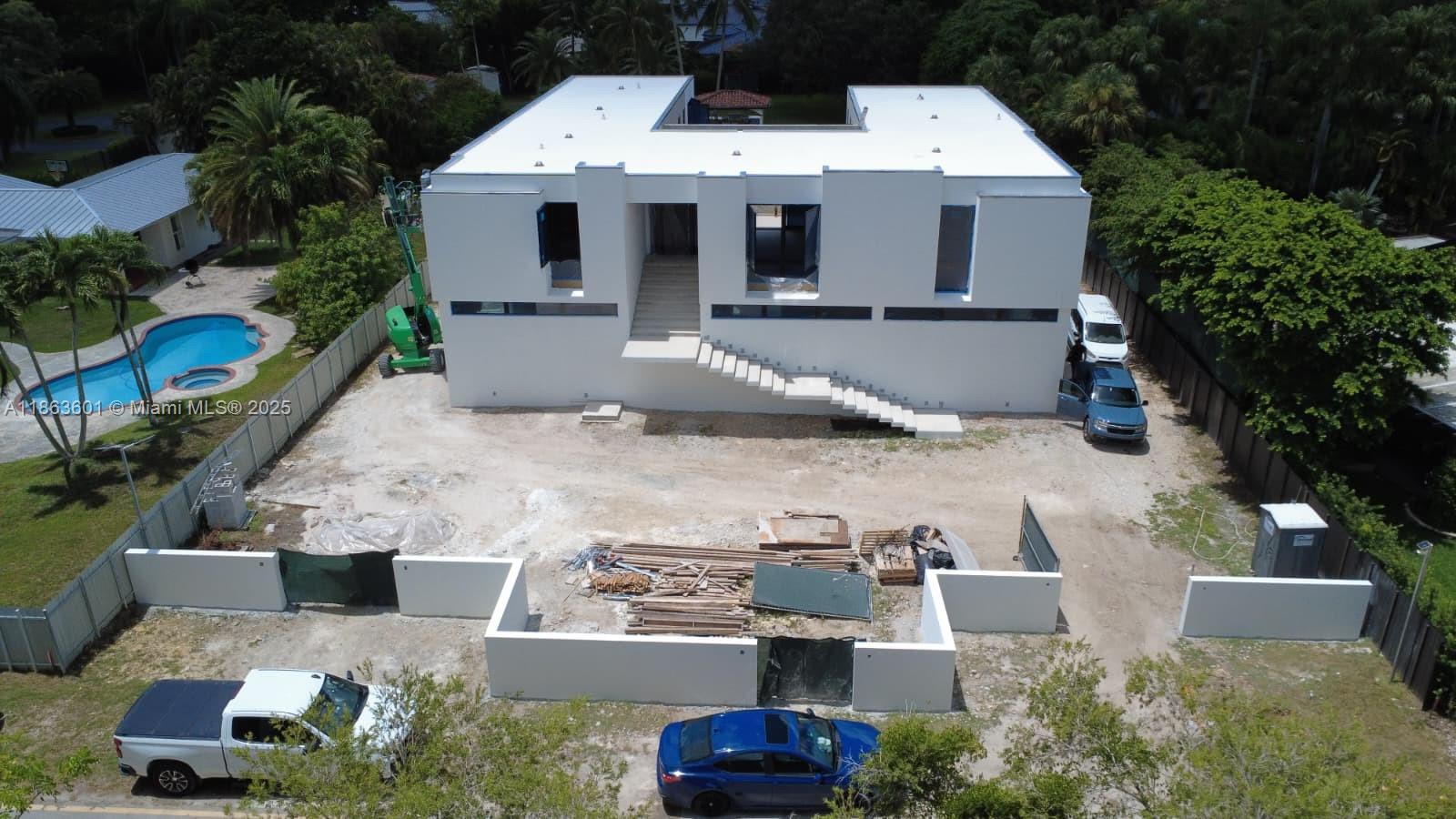 Exciting opportunity! A one of a kind custom new construction is underway in the heart of The Falls with an estimated completion date of May 2025. Situated on a rare 100x160 lot at the end of a private road, this stunning estate will feature 6 bedrooms, 8 baths and over 9,600 sq. ft. of living area. Highlights include garage parking for 6+ cars, a spacious recreation room, expansive pool area and much more. Truly a once in a lifetime find. Owner financing available.