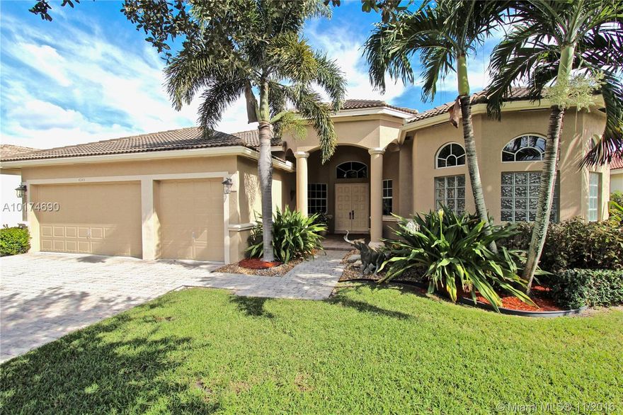 GRAND ISLE IS AMONG THE MOST PREMIUM GUARD GATED COMMUNITIES IN CORAL SPRINGS! This home has the perfect floor plan for any family, with a phenomenal pool and back patio area! 20 ft tall hedges encrust the backyard property line, giving full privacy to your family. Tons of natural light beam through entire home! Property includes: Granite kitchen counter tops, living room and family room, formal dining room, and additional room for an office/library/den.  The best rated schools in Coral Springs!