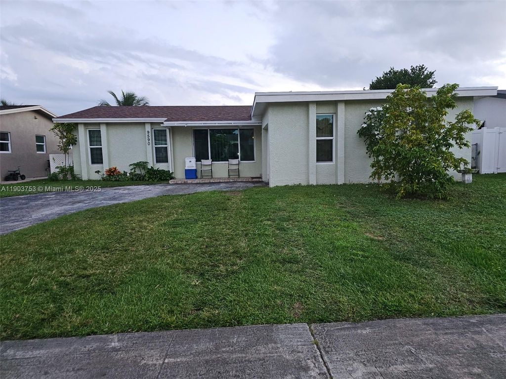 Photo of 9590 NW 21st Mnr, Sunrise, FL 33322 (MLS # A11903753)