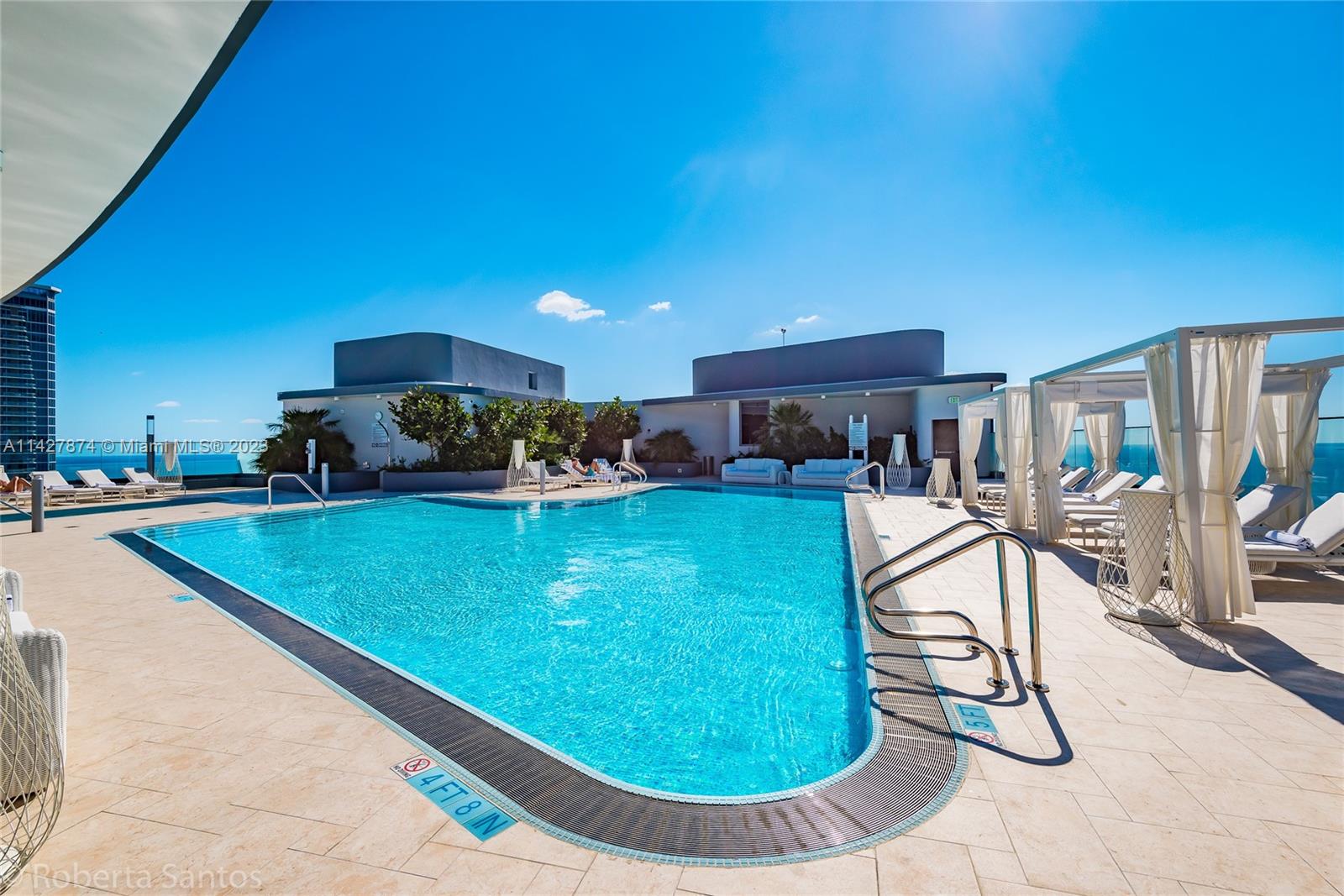 Live in one of Miami's tallest tower, the tallest residential condo building south of New York . This highly anticipated luxury building by Italian developer Ugo Colombo is outfitted with Miele appliances, includes two pools, club house, spa and more! This particular property is 2 bedrooms, 2.5 baths and includes 1 assigned and 1 valet parking.