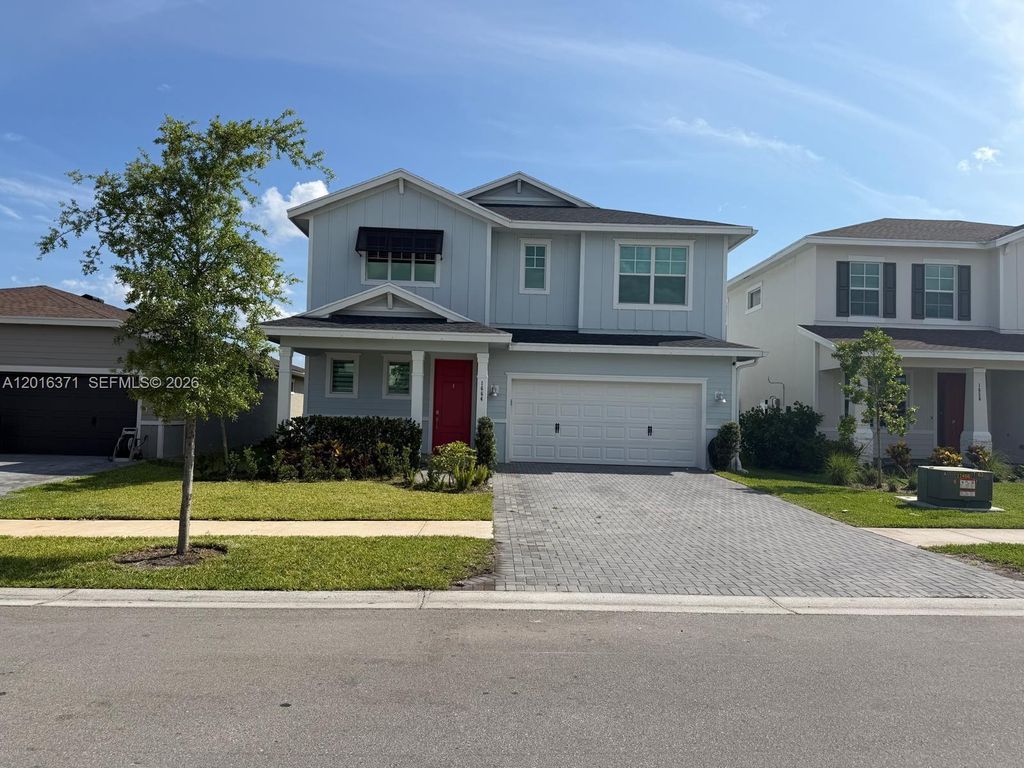 Photo of 1664 Wandering Willow Way #1664, Loxahatchee, FL 33470 (MLS # A12016371)