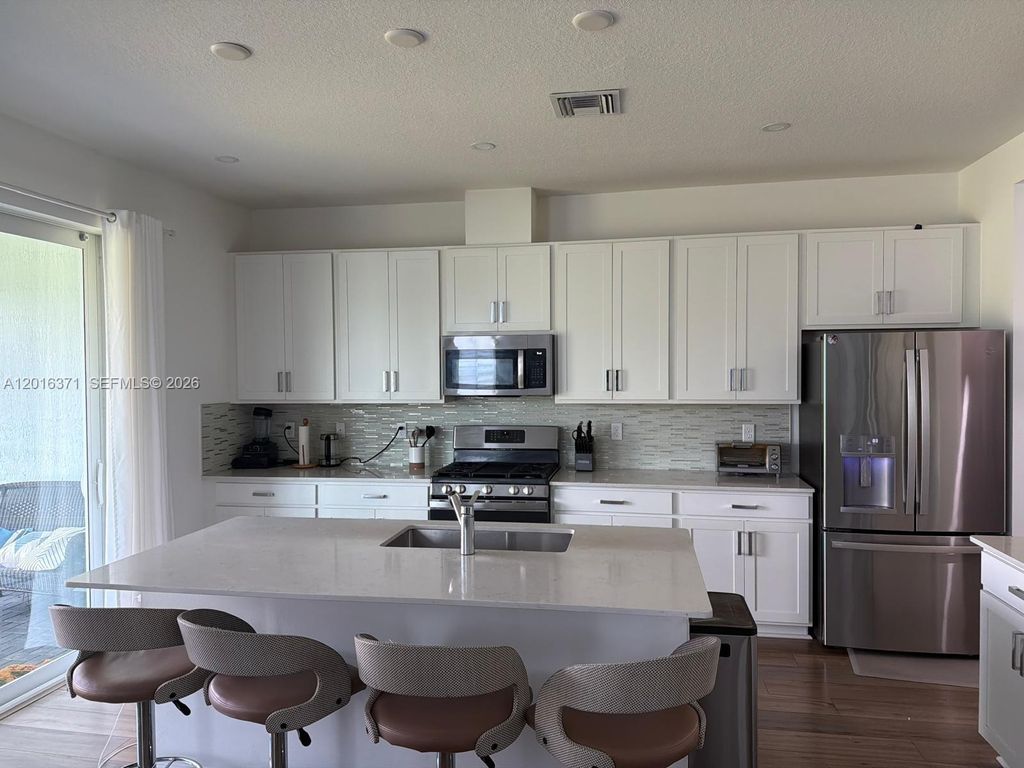 Photo of 1664 Wandering Willow Way #1664, Loxahatchee, FL 33470 (MLS # A12016371)
