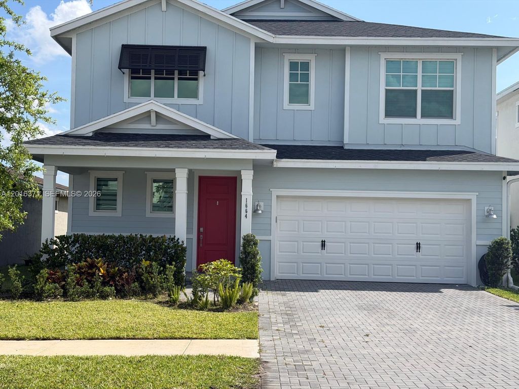Photo of 1664 Wandering Willow Way #1664, Loxahatchee, FL 33470 (MLS # A12016371)