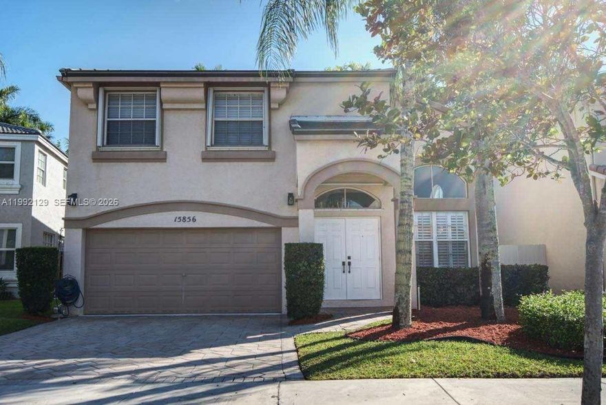 Original Model Home with all the added extra's in the sought after resort-style gated community of Royal Bay, Towngate.  This beautifully updated and maintained 2,287 sq. ft., single family home features 3 full bathrooms, 3 bedrooms with the opportunity to make it a 4 bedroom in a bright, open layout perfect for entertaining, newer Kitchen Appliances, newer Bamboo Wood Floors, New Roof 2025, Plantation Shutters installed in 2025, new Interior Paint, and new Water Heater.  Move in ready with no expenses spared, ample Cabinet space, Primary Bedroom features large walk-in Closet, en-suite Bathroom with dual Vanities, Roman tub, and separate Shower.  Fully fenced backyard with mature lush landscape, large patio area, deck, and room for a swimming pool.
Low HOA fees cover community amenities such as responsible and professionally managed Management, Fitness Center, multiple Swimming Pools, Tennis Courts, Basketball Courts, Playgrounds, Sports Fields, Recreation Center.  Prime location close to top-rated schools, Water Park, Trails, Shops at Pembroke Gardens, Pembroke Lakes Shopping Mall, Westfork Plaza, Movie Theaters, Fine Dining, easy access to major highways, and Miami Beaches.