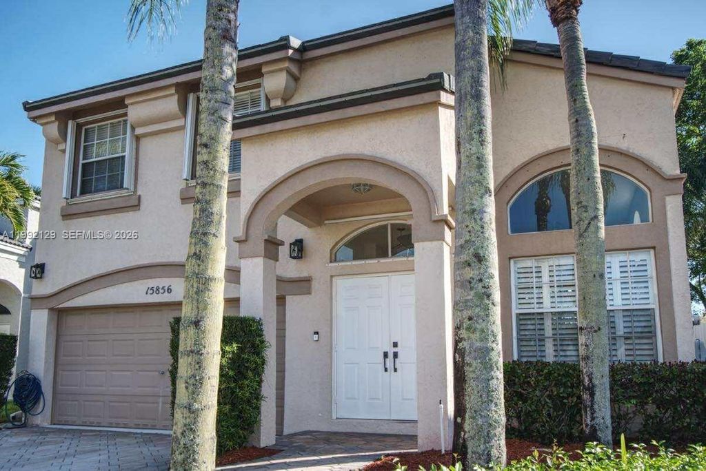 Photo of 15856 NW 12th Ct, Pembroke Pines, FL 33028 (MLS # A11992129)