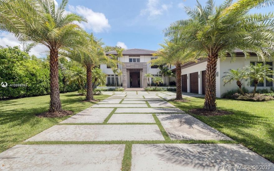 This contemporary, home 6 bedroom 6 1.2 Baths is surrounded by lush landscaping and well seasoned oaks. Experience tranquility in PRIME NORTHEAST PINECREST. Beautiful property just finished in 2016. Some of the home's features include: gourmet eat-in kitchen w/ top of the line appliances, summer kitchen, large pool w/connected heated spa, cabana bath, fireplace, wet bar w/built in wine storage, first floor guest suite, playroom and maids quarters, master suite w/ sitting room, office and balcony. walk in closets, elevator. Luxury living at it's finest.