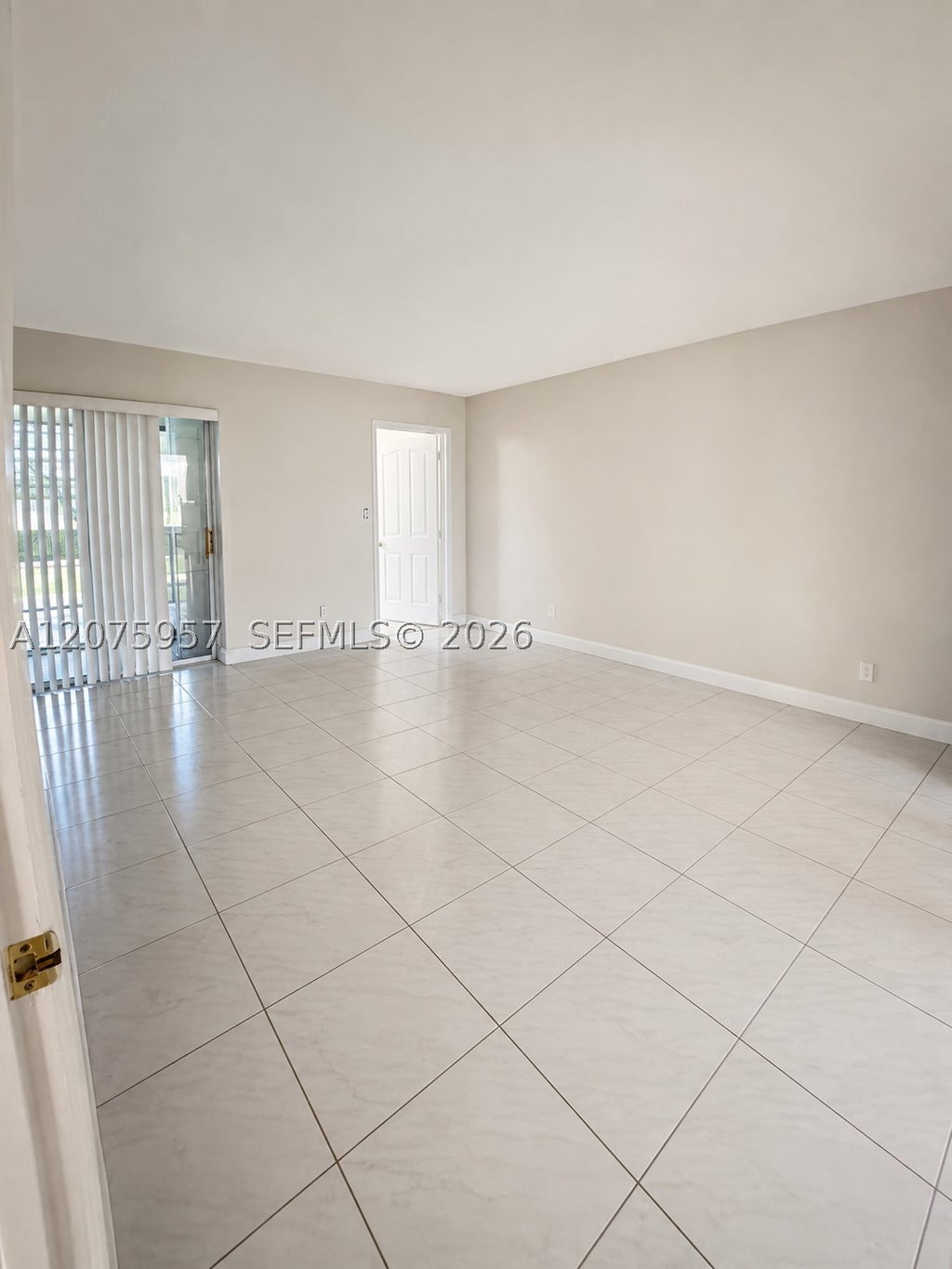 Photo of 3591 Inverrary Dr #104, Lauderhill, FL 33319 (MLS # A12075957)