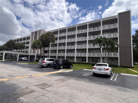 Photo of 1075 Riverside Dr #505, Coral Springs, FL 33071 (MLS # A12036171)