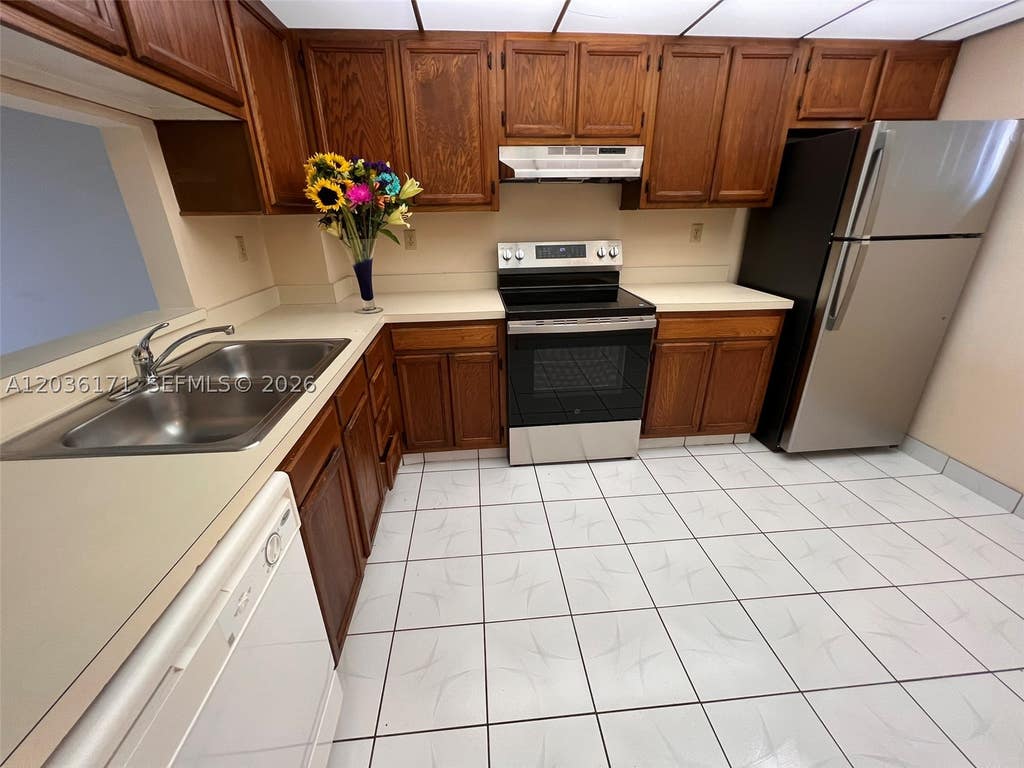 Photo of 1075 Riverside Dr #505, Coral Springs, FL 33071 (MLS # A12036171)