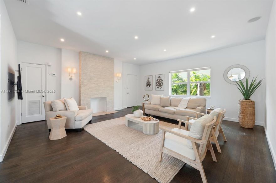 A tranquil retreat in the heart of Miami Beach - discover a rare opportunity to own a 3-bed, 2-bath condo in the charming Kim Aimee, an Art Deco building with just 11 units. This spacious residence features an updated kitchen, hardwood floors, and a large private patio overlooking a serene pool and the Biscayne Waterway. With a private 1-car garage, plus space in front of the garage to park an additional vehicle, this condo lives like a single-family home. Enjoy direct access to the Biscayne Waterway and peaceful residential living just minutes from the beach, 41st street shops, top-rated schools, golf courses, and convenient access to I-195.