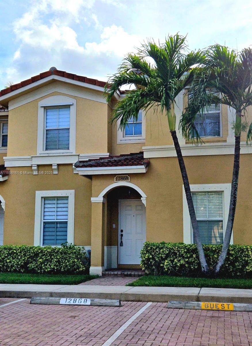 Welcome home! This two-story townhouse offers 3 bedrooms and 3 full bathrooms, with laminate flooring on the first floor and carpet on the second floor. The home includes a washer and dryer, located on the second floor for your convenience. The property is located near a lake, surrounded by greenery, and features a small balcony. Amenities in the gated community of Melrose Point include a pool, gym, playground and a clubhouse. It’s close to top-rated schools, with easy access to major highways like I-75, the Florida Turnpike, and I-595. Nearby, you'll find malls and supermarkets for added convenience. Don’t miss out on this incredible opportunity to live in a beautiful home with everything you need right at your fingertips!