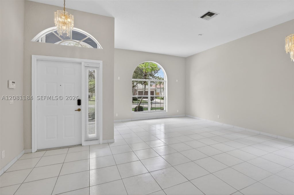 Photo of 13171 NW 19th St, Pembroke Pines, FL 33028 (MLS # A12081184)