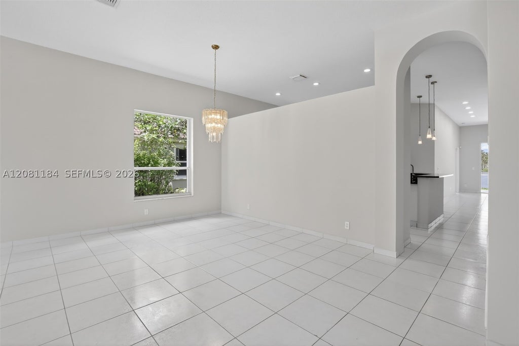 Photo of 13171 NW 19th St, Pembroke Pines, FL 33028 (MLS # A12081184)