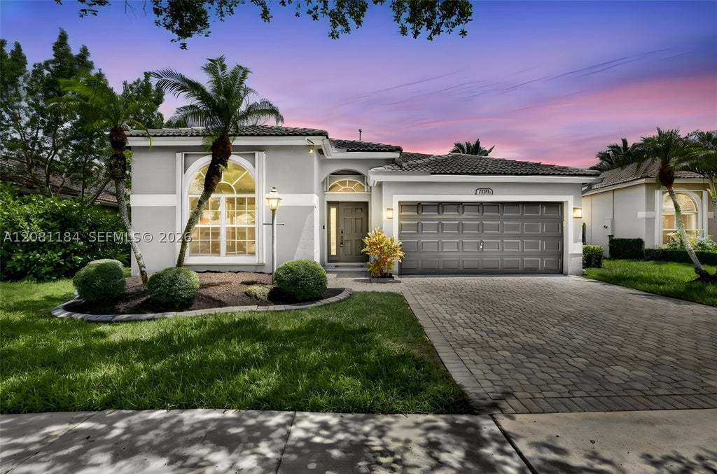 Photo of 13171 NW 19th St, Pembroke Pines, FL 33028 (MLS # A12081184)