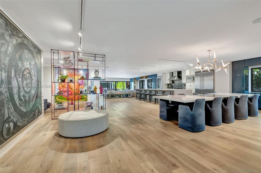 Welcome to this professionally designed, fully furnished, one-story 4,300 sq. ft. 5-bed, 5-bath by Dida Homes—completely rebuilt in 2015 and located in the coveted walkable South Bayshore neighborhood. Steps from Lincoln, Golf Course, Sunset Harbour, the beaches, this modern transformation offers all the luxuries of new construction without the price. Features include a heated pool, impact windows/doors, metal roof (2023), 2-car AC garage, laundry room, expanded chef’s kitchen w/Viking appliances, Savant smart home automation, motorized window treatments, indoor/outdoor speakers, security cameras. and more. Outdoors —an upgraded deck, limestone pavers, lit pergola, and a mosquito misting system create the perfect private retreat. As Featured in Florida Design Magazine! TURNKEY perfection.