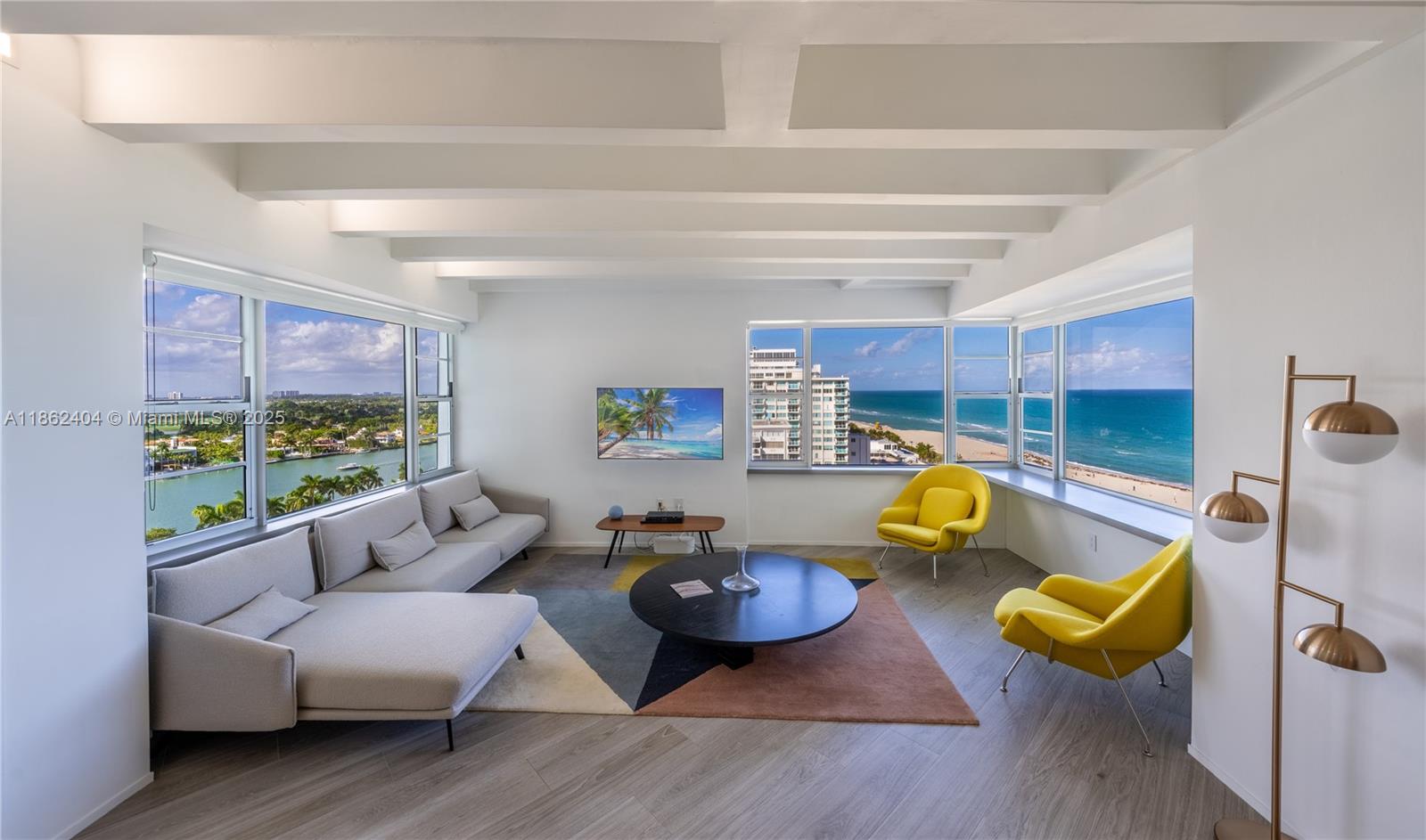 Breathtaking ocean views from every window in this spacious 2BR/2BA, 10-ft loft-style ceiling residence, offering nearly 1,500 sq ft of luxurious, redesigned space. Crafted by Italian architect David Longhi, this unit includes a private 120 sq ft poolside cabana with TV, full bath, and bar. Upscale finishes include Porcelanosa floors, premium appliances, auto Toto toilets, and custom Italian furnishings with pieces from DWR. Set in a landmark 1960s oceanfront building by Melvin Grossman with lush landscaping by Fernando Wong, enjoy 24/7 doorman, valet, boardwalk beach access, cabanas, fitness center, saltwater heated pool (temporarily closed, reopening December), and full beach service. Short-term rentals welcome (90-day minimum). Available furnished or unfurnished. SEE VIRTUAL TOUR.