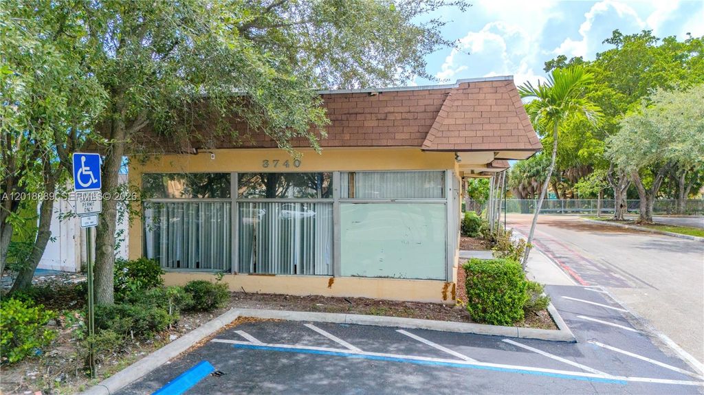 Photo of 3740 W Broward Blvd, Plantation, FL 33312 (MLS # A12018889)