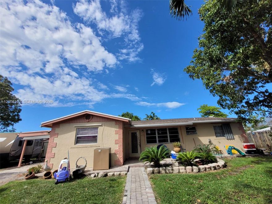 Great opportunity with a spacious lot offering plenty of room for a boat or RV. Property features a 2020 roof and 2021 A/C. The main home includes 3 bedrooms and 2 bathrooms, plus 1 bed/1 bath unit with private entrance—ideal for extended family or potential rental income. Property is being sold as-is and offers great potential.