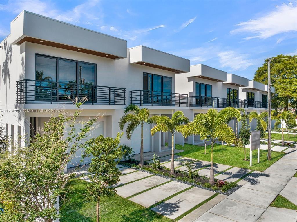 Victoria Park welcomes ONE PALM, the newest boutique project of 12 Twin Homes in the heart of everything Fort Lauderdale has to offer & built with the highest construction standards while enjoying the luxuries of sophistication & design throughout. These stunning two story residences feature an amazing open floor plan with expansive living space on the first floor, 3 bedrooms ensuite plus an additional huge loft and full laundry room on the second. Fenced in backyard with a full summer kitchen and plunge pool. 1 car garage. Custom made Italian Pedini kitchen cabinets and walk in closets, JennAir appliances, tankless gas water heater, floating wood stairs, porcelain tiles, 2 balconies, 10 FT ceilings are a few features. Come and pick your favourite home. Completion Q1 of 2025.