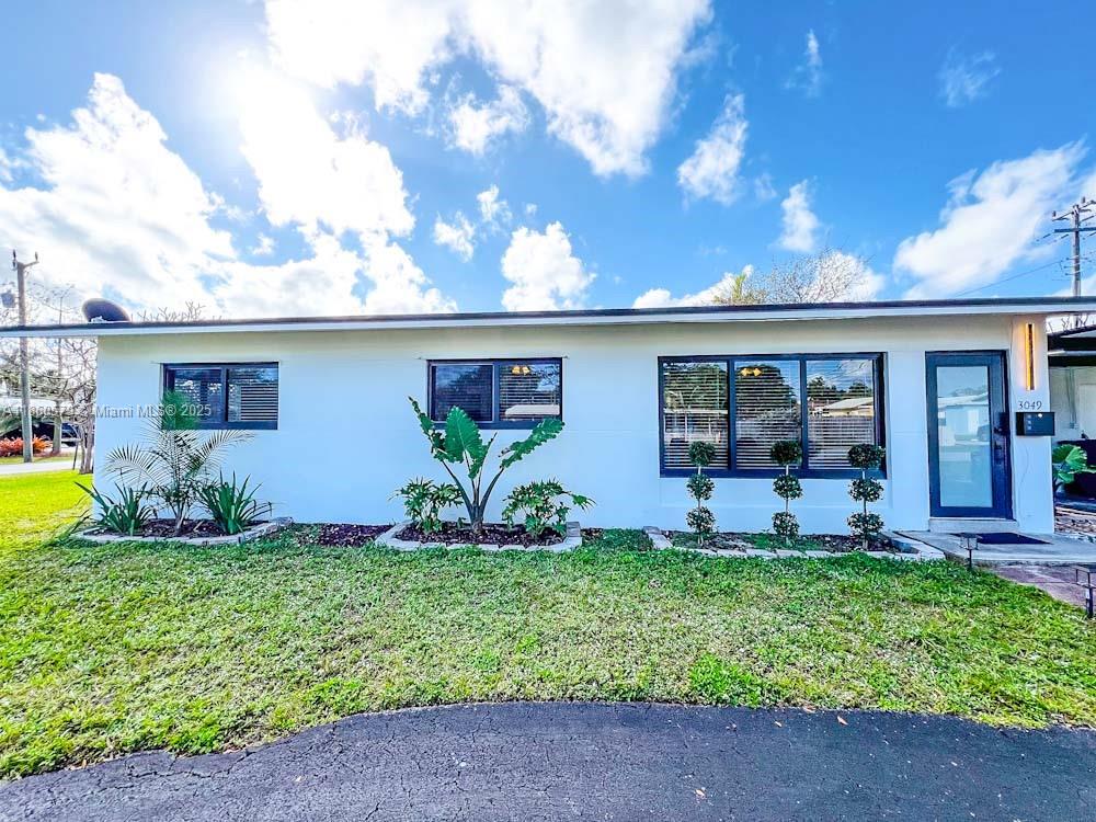 JUST GORGEOUSE 3 BEDROOM 2 BATH COMPLETLY REMODELED HOME. NEW KITCHEN WITH GUARZO CENTER TOP,STAINLESS STEELE APPLIANCESE NEW BEAUTIFUL REDONE BATHROOMS. WHITE CERAMIC FLOOR THRU-OUT THE WHOLE HOUSE. IMPACT WINDOWS ,EASY ACCESS TO EXPRESSWAY, RESTAURANTS, SHOPS, SHOPPING CENTER, CLOSE TO THE BEACH ALL WITHIN WILTON MANOR. EASY TO SHOW