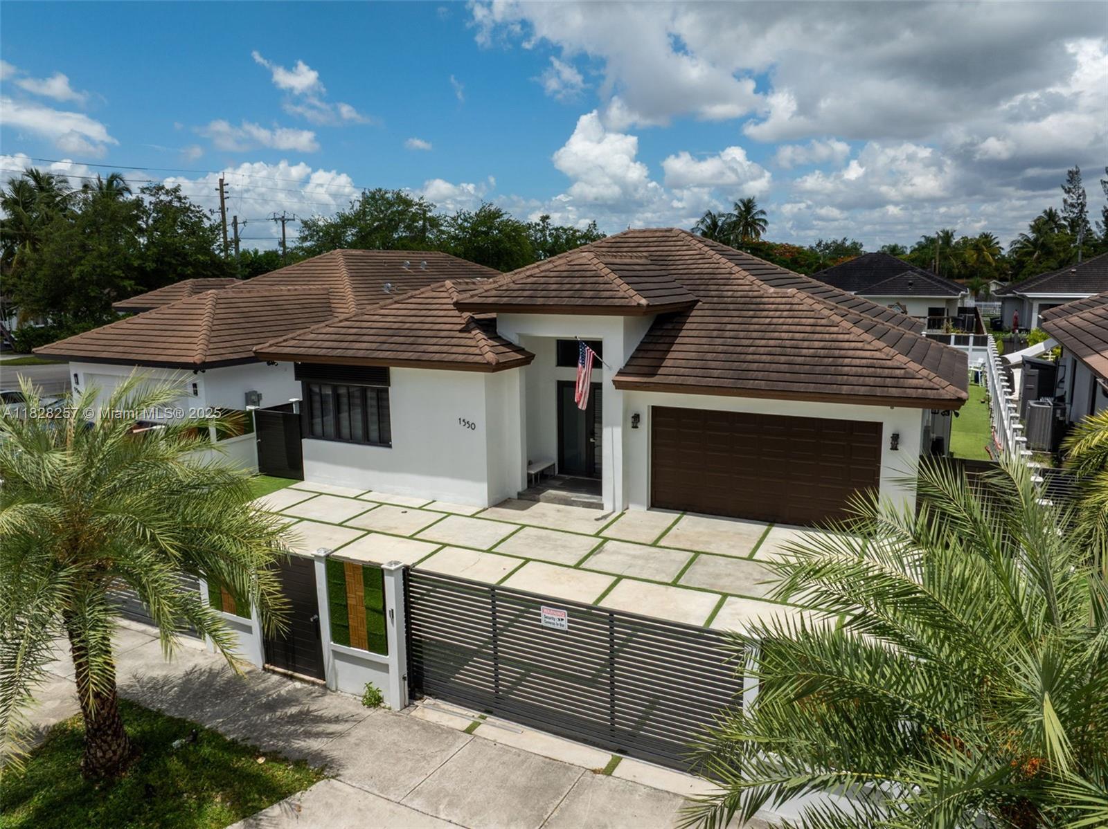 Step into a modern luxury oasis where every detail has been thoughtfully curated with top-of-the-line finishes and contemporary design. This fully updated home features 4 spacious bedrooms, 3 full bathrooms, and comes complete with a private in-law suite for ultimate flexibility and comfort. The backyard is designed for resort-style living, boasting a custom pool, summer kitchen, and putting green — the perfect setting for entertaining or unwinding in style.