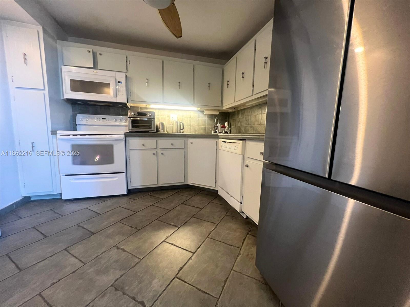 COMMODORE PLAZA CONDO - Residential