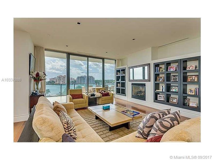 Apogee in South Beach:  A house in the sky offering four bedrooms, media room, living room and family room.  Exterior space offers an additional 2,440 sq/ft with a summer kitchen.  Garage space is enclosed with A/C.  Space for two cars and storage.  Views of Government Cut as ships coast by the ocean and South Beach.