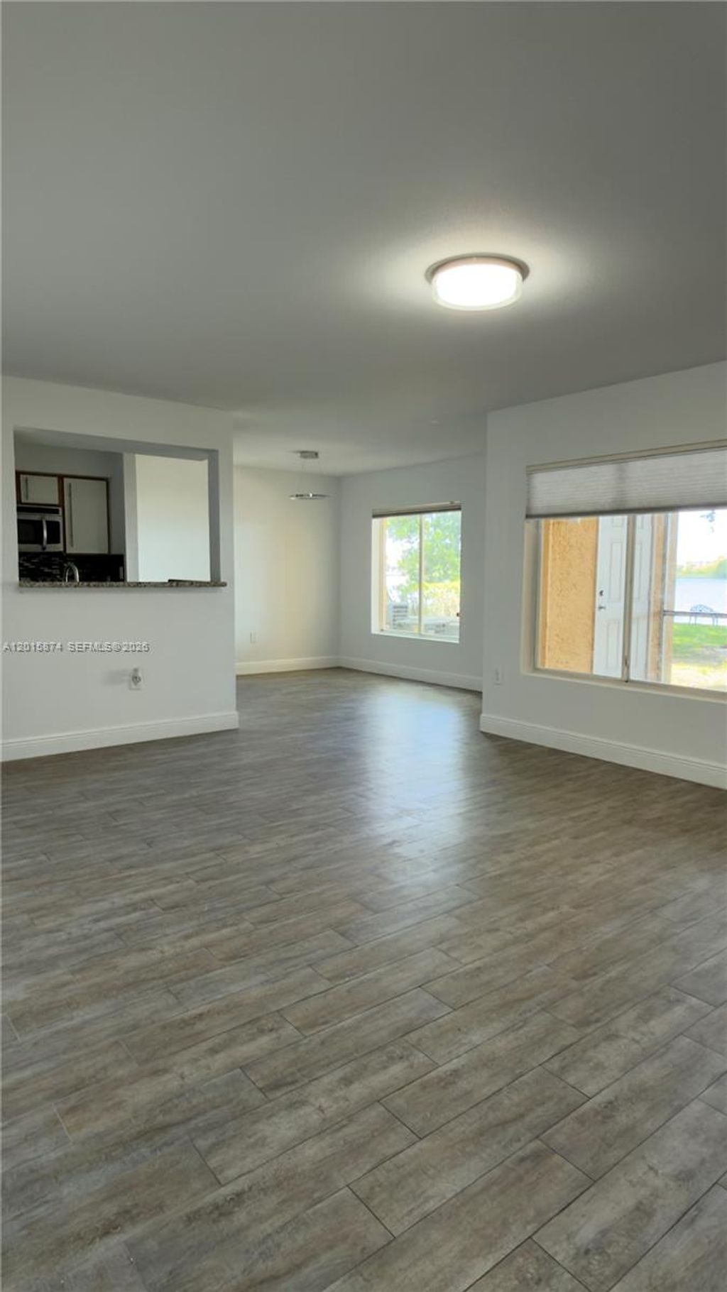 Photo of 2445 NW 33rd St #1404, Oakland Park, FL 33309 (MLS # A12015874)