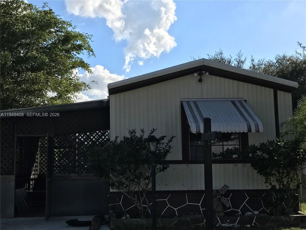 Photo of 10618 S 228th Ln #A, Boca Raton, FL 33428 (MLS # A11949408)