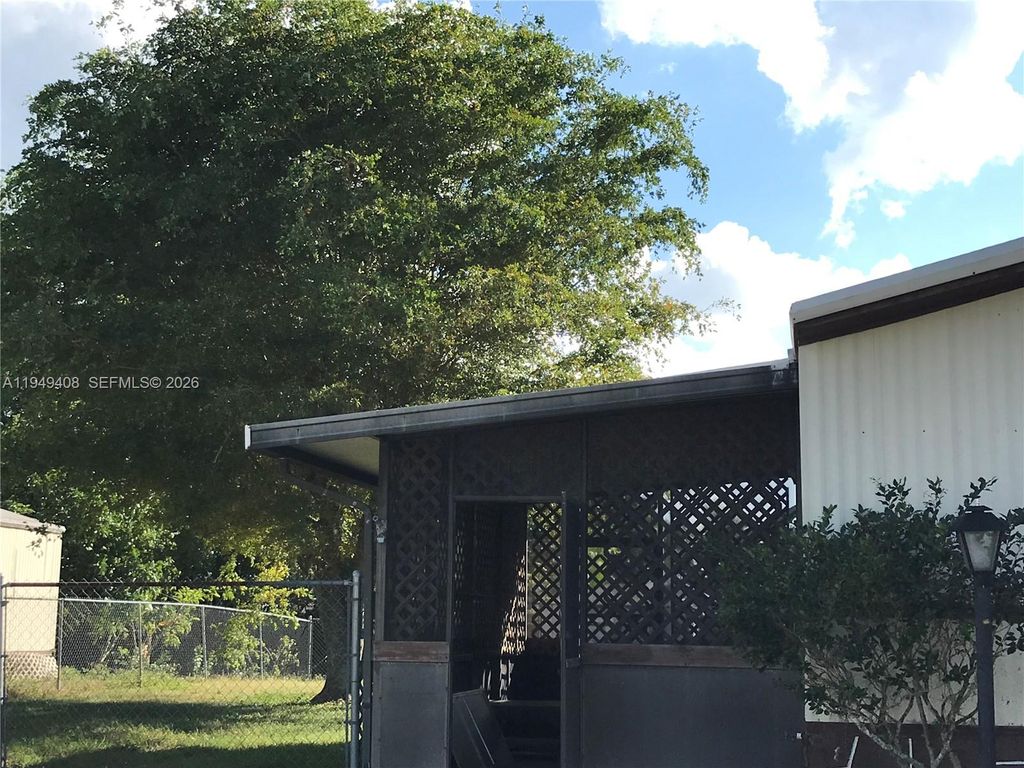 Photo of 10618 S 228th Ln #A, Boca Raton, FL 33428 (MLS # A11949408)