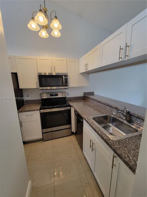 Photo of 958 Coral Club Dr #958, Coral Springs, FL 33071 (MLS # A11951211)