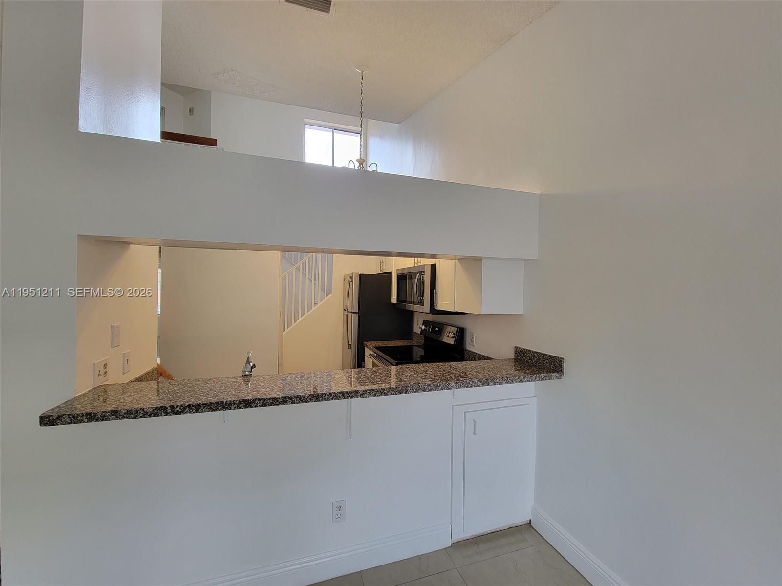 NAPOLI GARDENS AT CORAL S - Residential