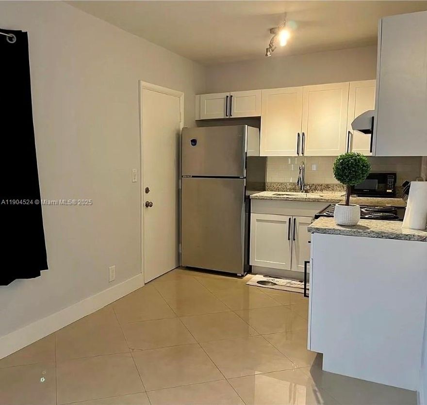 Spacious 1 bedroom, 1 bath unit on 2n floor with all vinyl floors and plenty of closet space. Close to major roads, Young Circle area with lots of dining and shopping, and minutes from the beach. Water/sewer included; 1 assigned parking space. Laundry available