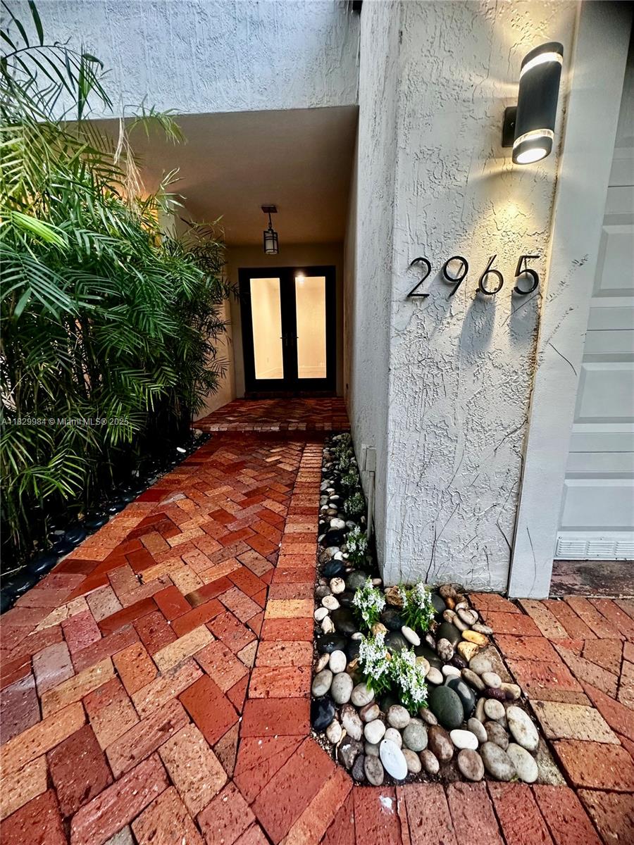 Experience the luxury of living in the highly sought-after Main Area in Coconut Grove in Miami. This exquisite townhouse boasts 3 bedrooms, 2.5 bathrooms, and a zen garden on the back, in a low traffic street. Make this your new home today! Just remodeled in 2024. Featuring impact doors and windows, (includes a pet door), newly refreshed Kitchen, large customizable walk in closets, lighted Mirrors and floating vanities, new roof ( 2024) and night LED recessed lights, available by September 1, 2025. Additionally, you have the option to rent the property fully furnished (inquire). Don't miss out on this incredible rental opportunity – secure this property before it's gone!