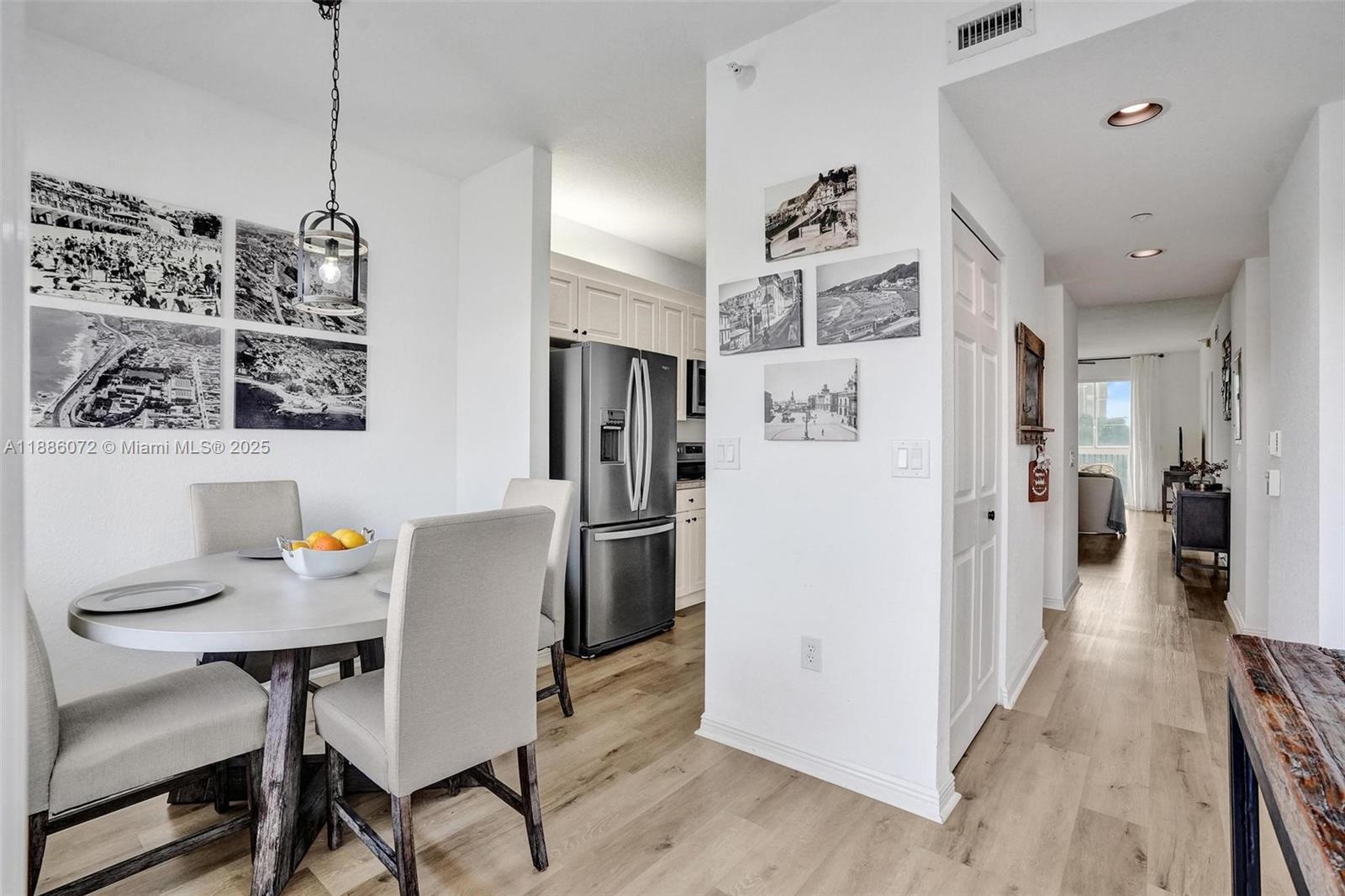 Pristine, updated condo located on third floor with beautiful lake view in immaculately clean condition. Patio has the closed window option to keep out heat and rain, or to open up for fresh air.  Enjoy relaxing on your balcony with quiet peaceful water view. Featuring a large, light, and bright kitchen with an eat-in breakfast area, dining/living area(s). Updated kitchen counters, newer S.S. appliances, impact windows, updated vinyl flooring throughout, Newer Washer & Dryer, updated fixtures and lighting throughout, and more. Perfect location with everything you need nearby. Located in Southampton, a guard gated community for those who are 55+ and who enjoy living in an active adult community. there is a fitness center, pool, tennis courts, pickleball courts, clubs, live shows and more!!