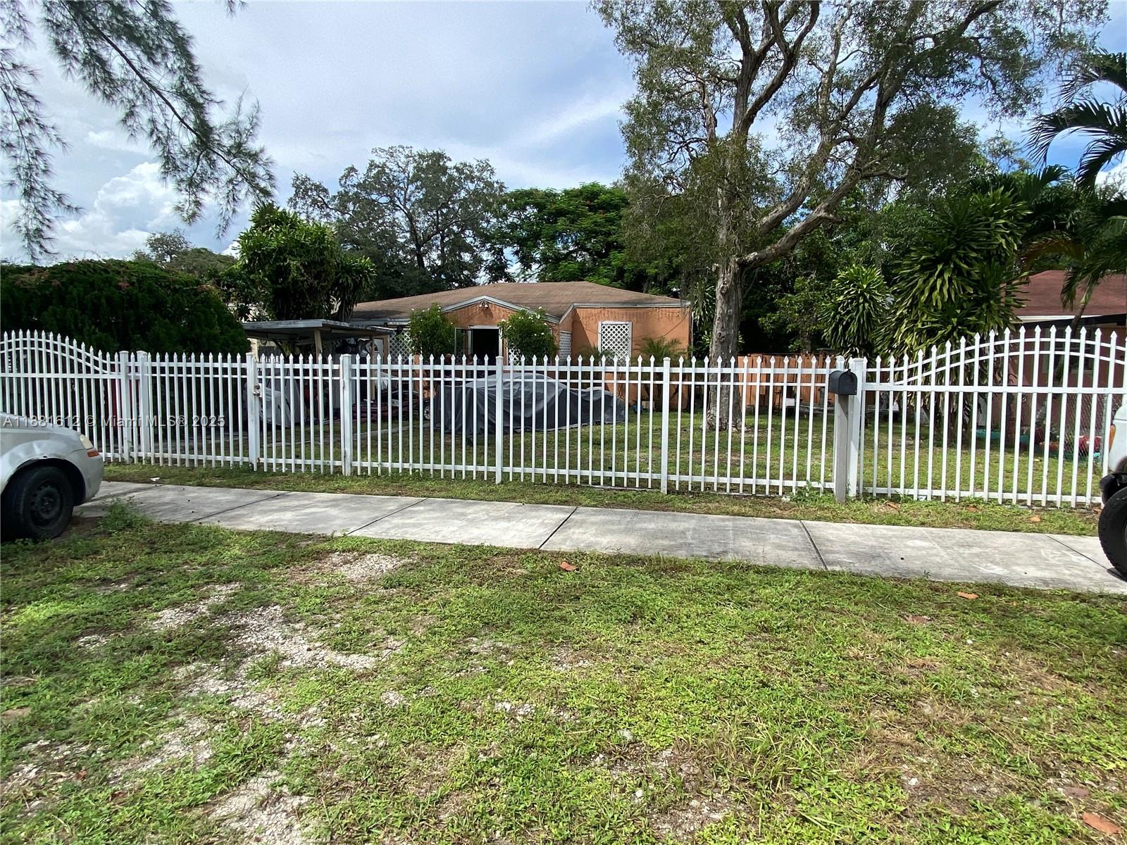 This home is currently a 4/2, with an additional structure, which could be converted into a separate in-law quarters. With a great lot size and full of potential, this home is ready for a buyer who is looking to make a lucrative investment.