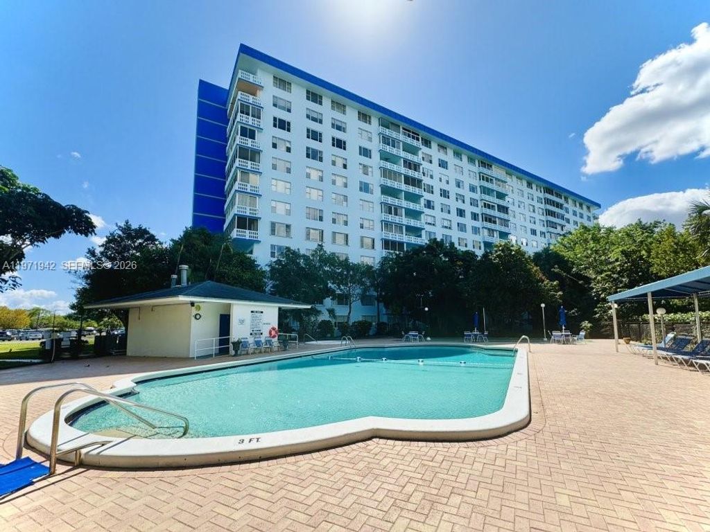 Photo of 4001 Hillcrest Dr #909, Hollywood, FL 33021 (MLS # A11971942)