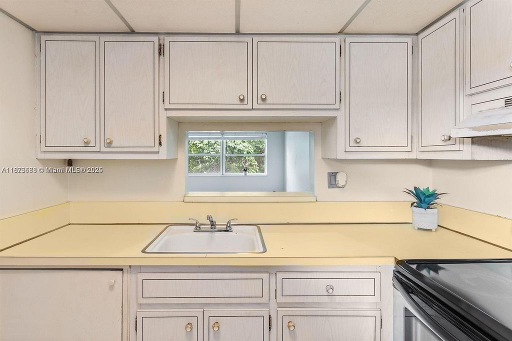 Photo of 5011 W Oakland Park Blvd #307, Lauderdale Lakes, FL 33313 (MLS # A11873688)