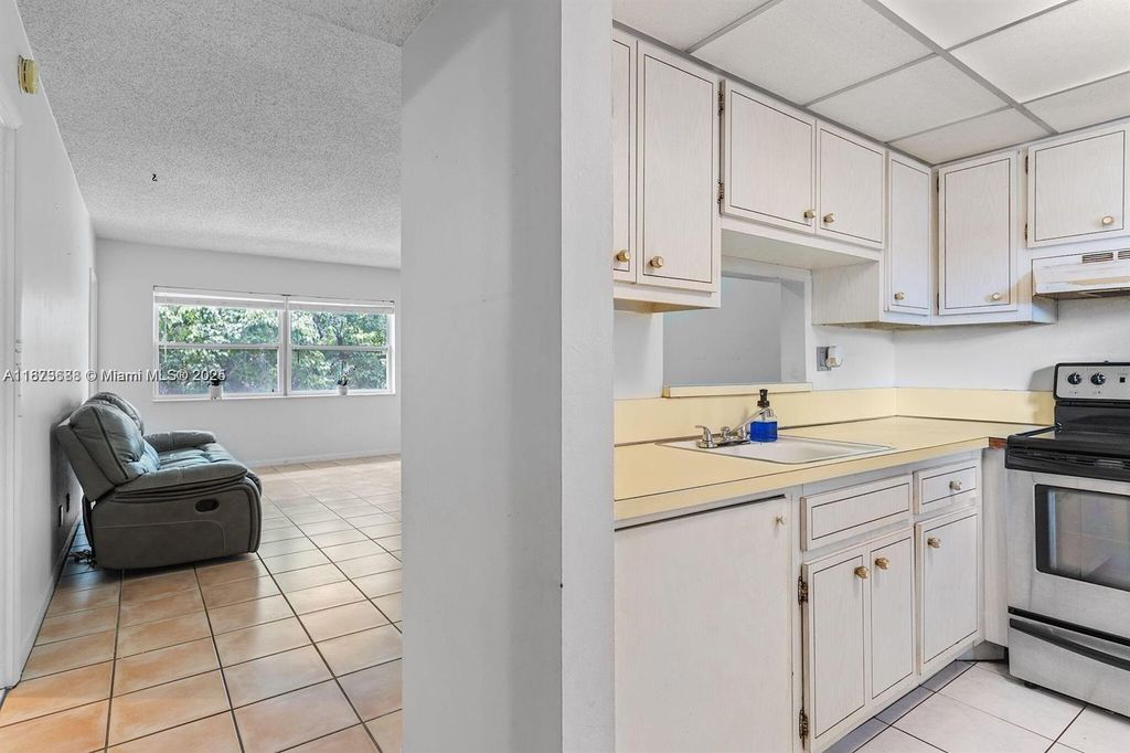 Photo of 5011 W Oakland Park Blvd #307, Lauderdale Lakes, FL 33313 (MLS # A11873688)