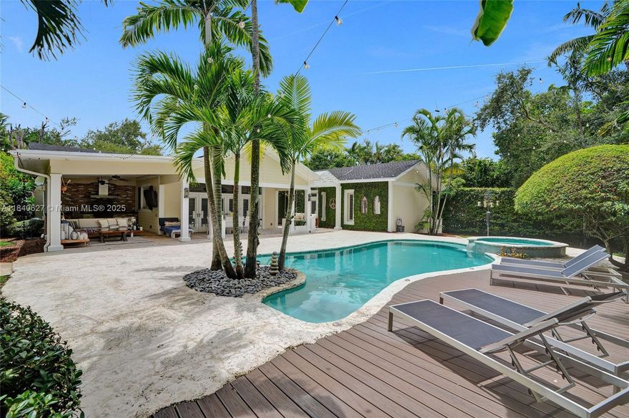 Welcome to your Private Oasis, nestled in a highly desirable neighborhood located near top-rated Schools, US-1, Hospitals & more. Step into a sunlit/open-concept home with Soaring 12' Vaulted Ceilings. A seamless flow between the living/family room & the Newly Renovated Chef’s Kitchen, complete with a jumbo island, under-counter fridge/freezer & ample storage. Each of the 4 bedrooms feature its own En-suite Baths. The well-lit landscaped grounds create a Private Resort-Like Atmosphere.  French doors lead to the Tropical Backyard retreat: Saltwater Pool & Jacuzzi w/ full Cabana Bath, expansive Covered Patios, built-in BBQ & a Full Summer Kitchen—all gated for privacy. Extra features: Hurricane impact windows/doors, Natural Gas Generator, 2-car Garage, Circular Driveway & Irrigation system.