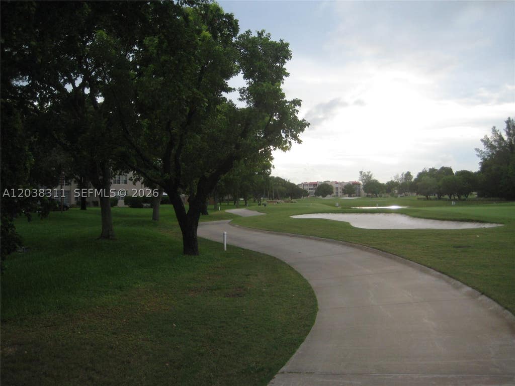 Photo of 9460 Tangerine Pl #101, Davie, FL 33324 (MLS # A12038311)