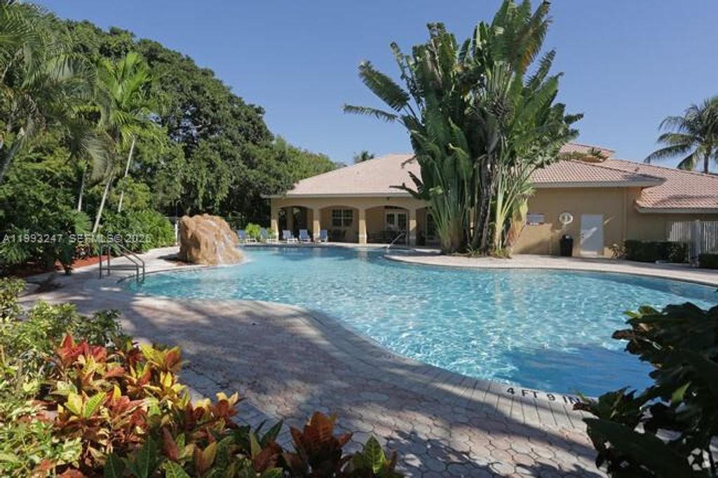 Photo of 5520 NW 61st St #201, Coconut Creek, FL 33073 (MLS # A11993247)