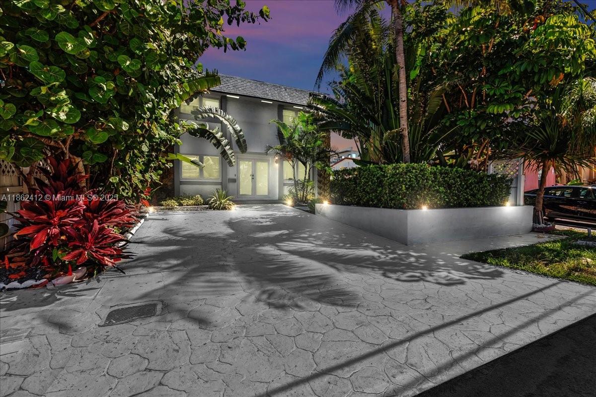 Coastal Retreat – Just 8 Doors from the Beach! This beautifully remodeled 4 bed, 3 bath home is less than a minute’s walk to both the Atlantic Ocean and Intracoastal. Bright and airy interiors feature neutral tones, large windows, and an open layout that flows seamlessly into a modern gourmet kitchen, perfect for entertaining. The spacious fenced backyard offers privacy, room to relax or grill, and comes with a full security camera system for peace of mind. With no HOA, enjoy the freedom to make it your own. Wake up to ocean breezes, spend your days paddleboarding or boating, and unwind with stunning sunsets. Ideally located near Hollywood’s dining, shopping, nightlife, and just minutes to major roads and airports.