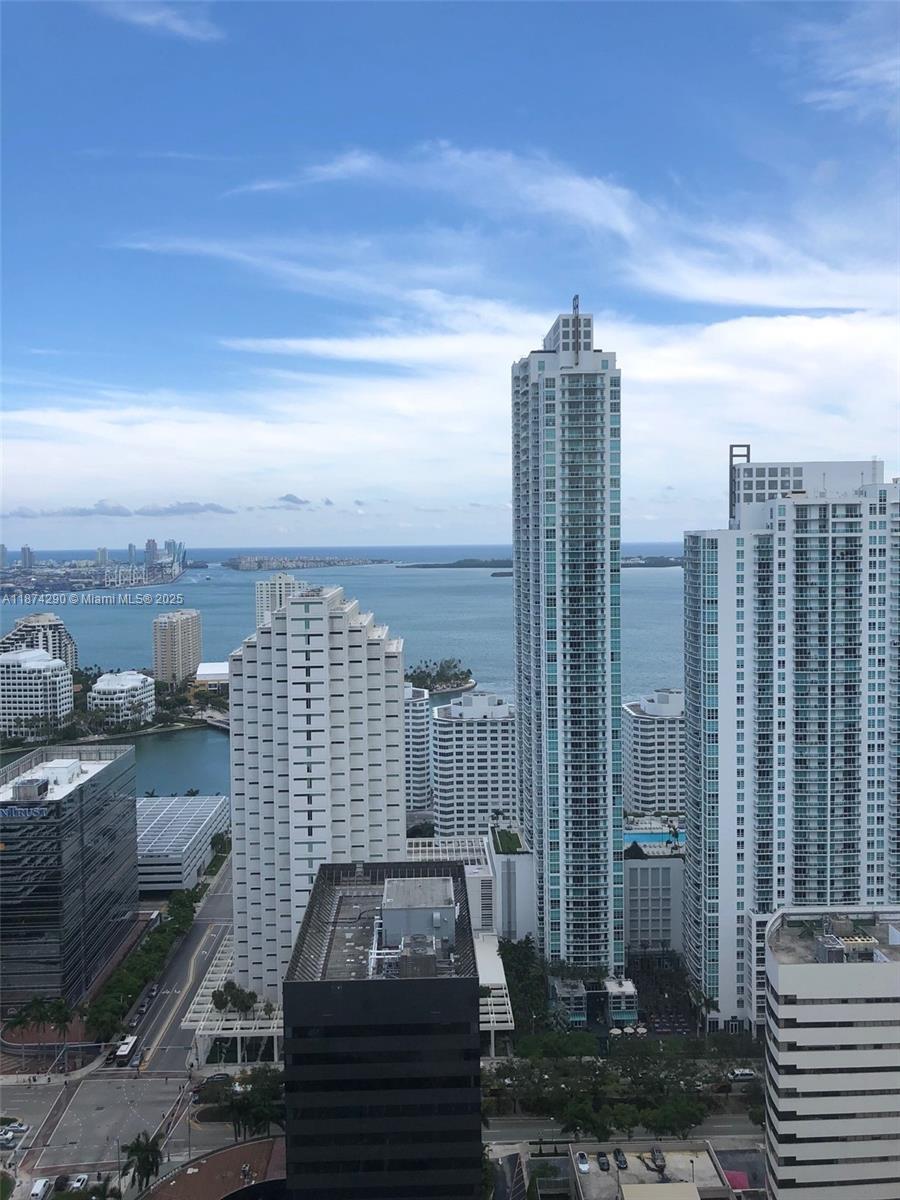 Beautiful unit in the luxury building of the SLS LUX. Located across from the Brickell City Center. 1 bedroom + DEN /2 full bathrooms with spectacular city and water views, private elevator foyer, Italian kitchen and tile floors. Unit has the following upgrades: marble kitchen counter tops, LED illuminated back-splash, beautiful master closet finishes and textures, electric-powered shades and blackouts. On the 9th floor SLS Lux has the most beautiful amenities: 2 pools, cabanas, lots of lounge areas to relax, mini golf, outdoor climbing wall & workout machines, kids playroom, gym, spa and sauna/steam room, valet and hotel service.