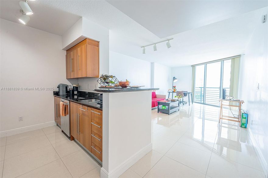 Experience the best of downtown living in this stunning 1-bedroom residence at One Miami Condominium, perfectly positioned for city energy and serene bay views. Wake up to sweeping panoramas of Biscayne Bay and Bayside Park, right from your window. Amenities include 2 gyms, pool and hot tub, business center, kids room, game room, convenience store and the prestigious Il Gabbiano & Mastro's Ocean Club restaurants. Within close distance from Whole Foods, Hell’s Kitchen, Kaseya Center, Bayside Park, Brickell City Centre, the Metromover, and Silverspot Cinema. Everything you need for work, play, and relaxation is at your fingertips. One parking spot assigned and valet parking if needed.