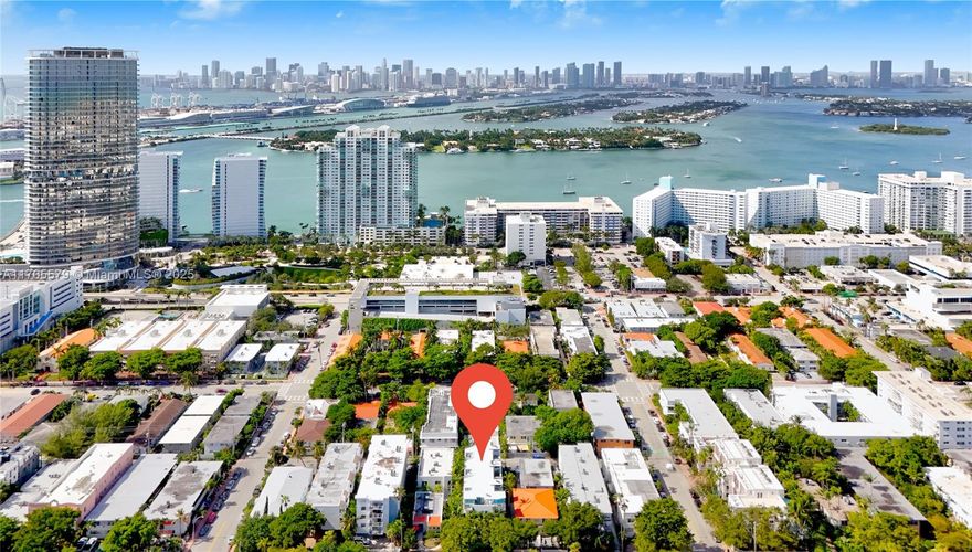 Two independent adjacent Modern South Beach Tri-level townhomes loft style  that can be combined for a total of 2890 sq feet 4 bedrooms, 4.5 baths, 2 private rooftop terraces, 2 cover parking spaces producing $12,800 per month; soaring 28  ft ceilings. ( Secure complex with only 7 Townhouses) . White porcelain plank floors, stained concrete floors throughout respectively.  Bright open living space, high Impact windows and doors. Unbeatable location within 2 blocks to the shopping center on Alton Rd and 5th Ave. Walk to Flamingo Park, the Beach, Lincoln Road, shops, restaurants. Publix, Total Wine and Whole Foods. This exclusive and private residence gives you the opportunity to enjoy luxury in a prime location without the hassle of high rise living. Low Maintenance fees.